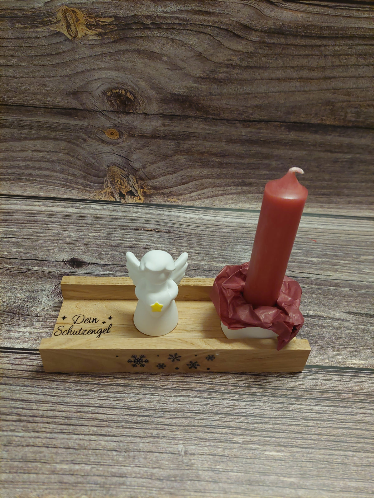 Stabkerze mit kleiner Figur